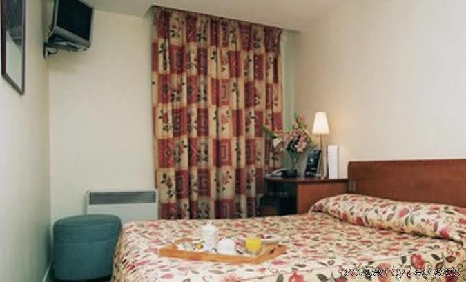 Hotel Le Montana Paris Quarto foto